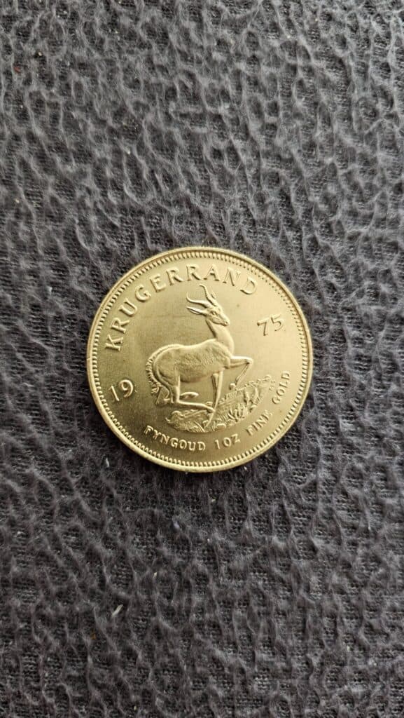 “Taxatie van een gouden Krugerrand uit 1975 in perfecte staat zonder zichtbare beschadigingen”