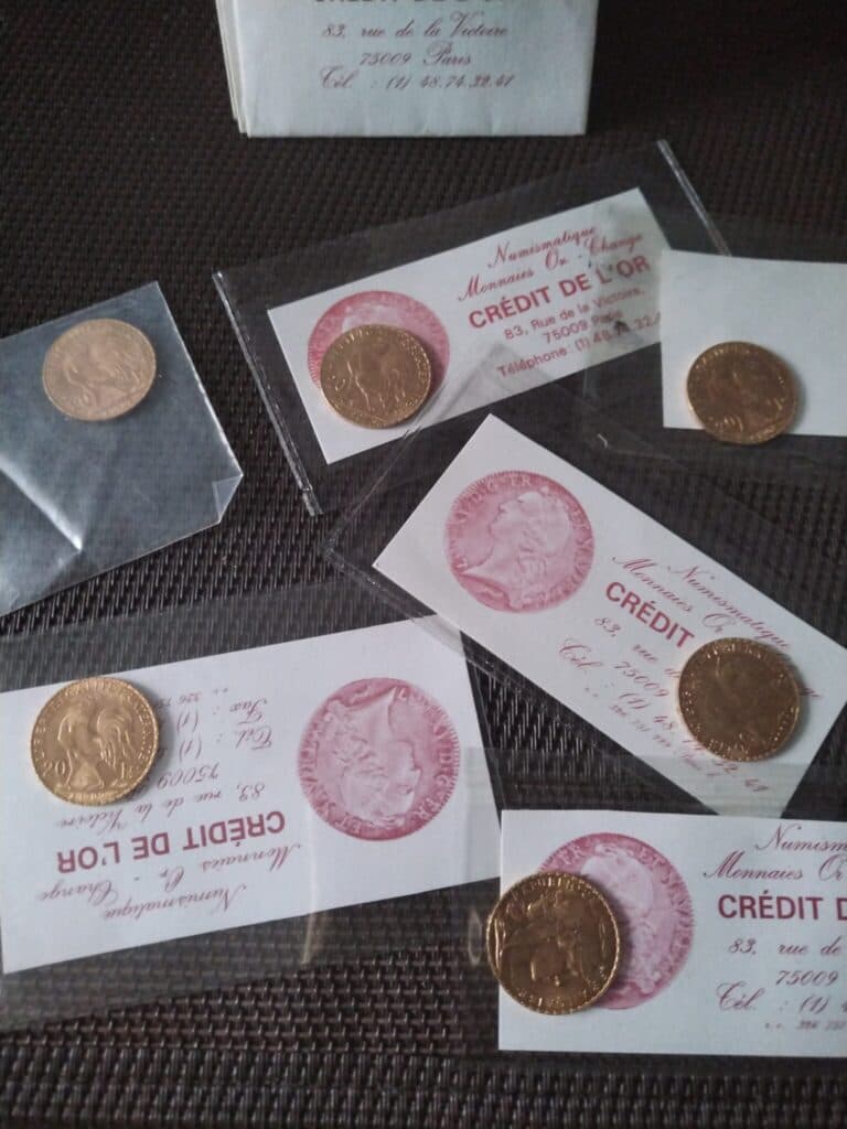 Taxatie van de waarde van 20 gouden munten uit het begin van de 20e eeuw Taxatie van de waarde van 20 gouden munten uit het begin van de 20e eeuw