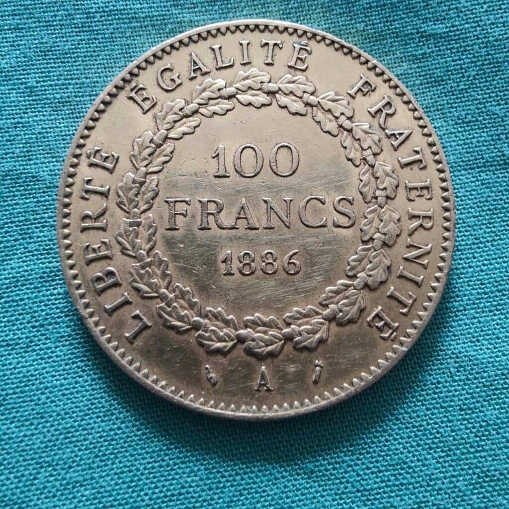 Taxatie van de waarde van een munt van 100 francs uit het jaar 1886