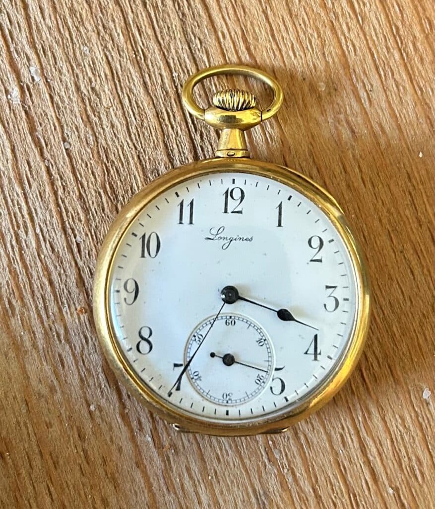 Taxatie van de waarde van een Longines zakhorloge van goud met een gewicht van 61g Taxatie van de waarde van een Longines zakhorloge van goud met een gewicht van 61g